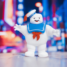 Load image into Gallery viewer, Goo Jit Zu Ghostbusters Stay Puft squishy toy on colorful background.
