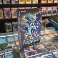 Load image into Gallery viewer, Yu-Gi-Oh! Battles of Legend Chapter 1 set featuring iconic cards and collectible dice in a card shop display.
