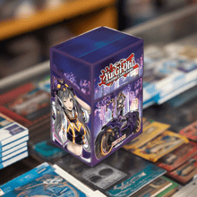 Load image into Gallery viewer, Yu-Gi-Oh! I:P Masquerena Deck Box with artwork on display at a card store.
