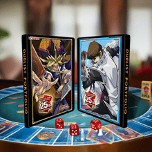 Load image into Gallery viewer, Yu-Gi-Oh! Yugi &amp; Kaiba Quarter Century Duelist Portfolio on a game table with dice.
