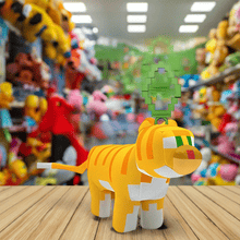 Load image into Gallery viewer, Minecraft 5 Inch Cat Bag Hanger Plush with pixelated design on wooden display.
