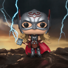 Load image into Gallery viewer, Marvel Thor Love &amp; Thunder Mighty Thor Pop! Vinyl Figure with Mjolnir on rocky backdrop.
