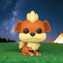 Load image into Gallery viewer, Growlithe Pokemon POP! Vinyl Figure on grass with starry night background.
