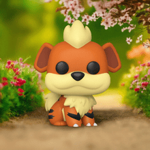 Load image into Gallery viewer, Growlithe Pokemon POP! Vinyl Figure with distinctive orange fur and black stripes, in garden setting.
