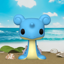 Load image into Gallery viewer, Lapras Pokemon POP! Vinyl Figure on a beach background with blue sky.
