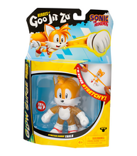 Load image into Gallery viewer, Goo Jit Zu Sonic Glow Surge - Tails stretchable glow-in-the-dark figure in packaging.
