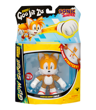 Load image into Gallery viewer, Goo Jit Zu Sonic Glow Surge Tails figure in packaging, stretchy and glow-in-the-dark.
