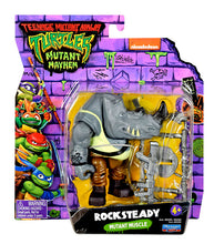 Load image into Gallery viewer, Teenage Mutant Ninja Turtles Movie Rocksteady action figure in Mutant Mayhem packaging with accessories.
