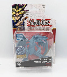 Blue Eyes White Dragon Yu-Gi-Oh! battle figure with exclusive card in packaging.